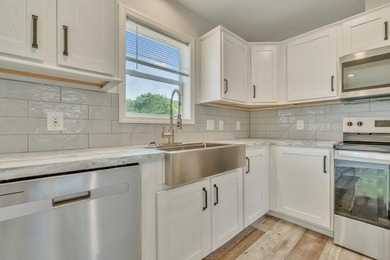 Discover the ease of single-level living in this beautifully - photo 5