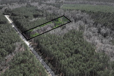 Great price for almost 2 acre lot in a great subdivision at the - photo 1