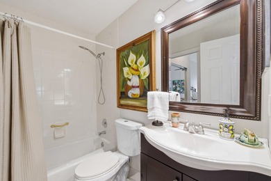 Immaculately maintained + bright, this airy 2/2 waterfront villa - photo 18