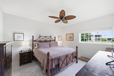 Immaculately maintained + bright, this airy 2/2 waterfront villa - photo 19