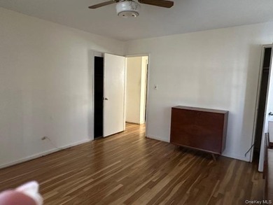 Two bedroom deluxe, oak floors, close to all, lower unit. Base - photo 10