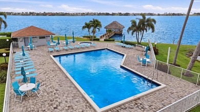 Immaculately maintained + bright, this airy 2/2 waterfront villa - photo 42