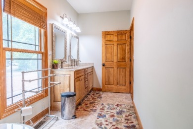 Stunning Lakefront Manor with 3 Large Bedroom Suites! - photo 17