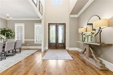FOUR car garage! Primary suite options on both the main and - photo 9