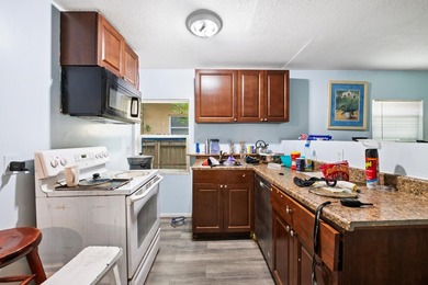 Discover this charming 3-bedroom, 1-bathroom single-family - photo 7