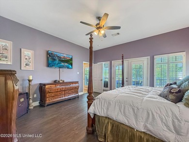 Welcome to this Riverfront gem on the Tchoutacabouffa! 3 Beds | - photo 6