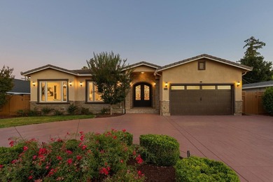 Welcome to 18548 Paseo Tierra in Saratoga, a stunning executive - photo 2