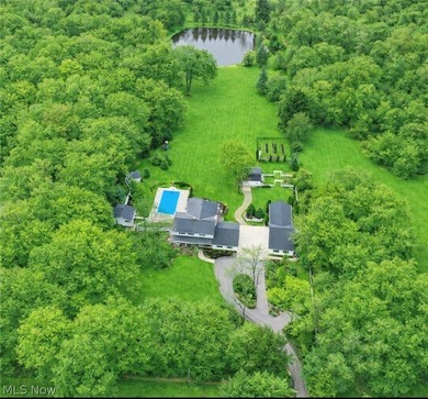 Set amidst over 5 acres of breathtaking, manicured grounds, this - photo 34
