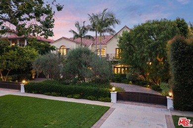 Set behind private gates with a circular driveway, this - photo 1