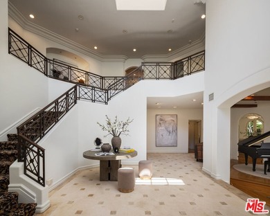 Set behind private gates with a circular driveway, this - photo 2