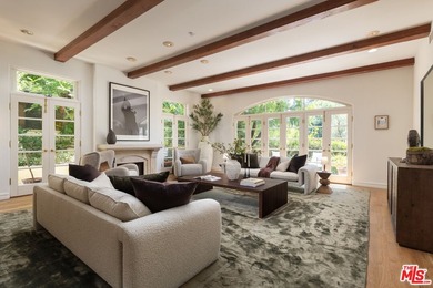 Set behind private gates with a circular driveway, this - photo 3