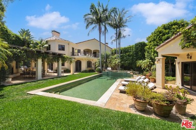Set behind private gates with a circular driveway, this - photo 10