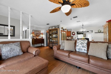 Welcome home to this beautifully maintained property featuring a - photo 6