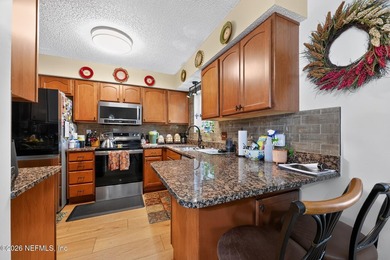 Welcome home to this beautifully maintained property featuring a - photo 8
