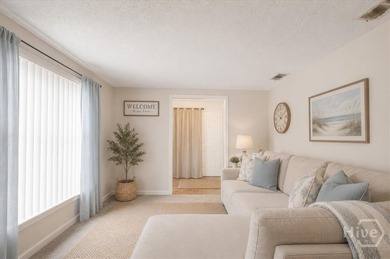 This all brick 3-bedroom, 1-bath all-brick home presents an - photo 5