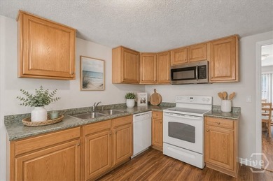 This all brick 3-bedroom, 1-bath all-brick home presents an - photo 6