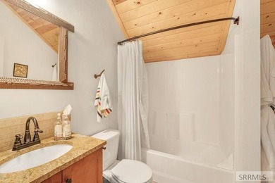 Perched on a half-acre of pristine land, this full-log retreat - photo 26