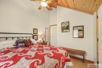 Perched on a half-acre of pristine land, this full-log retreat - photo 29