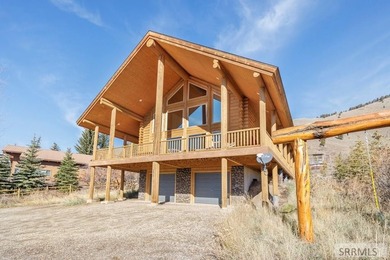 Perched on a half-acre of pristine land, this full-log retreat - photo 37
