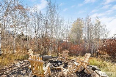 Perched on a half-acre of pristine land, this full-log retreat - photo 41