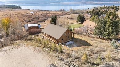 Perched on a half-acre of pristine land, this full-log retreat - photo 47