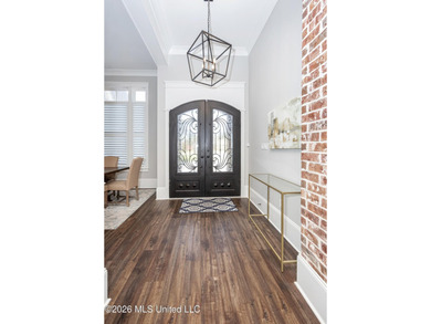 Welcome to this stunning custom-built home in the highly - photo 8