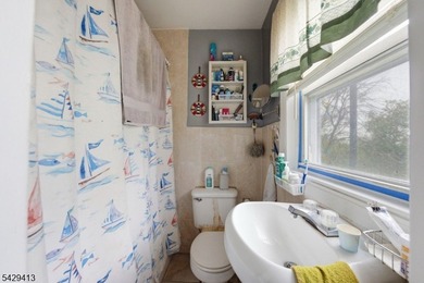 Welcome to 143 Terrace Ave, a rare 3-family opportunity in the - photo 11