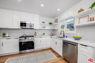 Welcome to this completely renovated, thoughtfully redesigned - photo 9