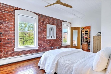 Live above the vibe of the West Side, a block from Downtown - photo 13