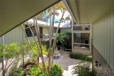Welcome to this quaint 2-bedroom, 2-bath condo nestled among - photo 4