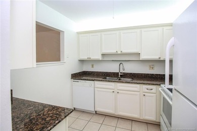 Welcome to this quaint 2-bedroom, 2-bath condo nestled among - photo 9