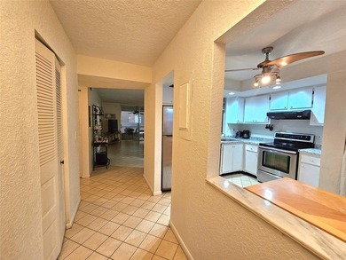Welcome to this charming corner unit, 2 bed, 2 bath fully