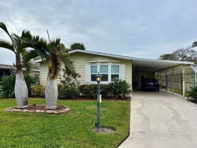 Lake Home For Sale in Hobe Sound, Florida