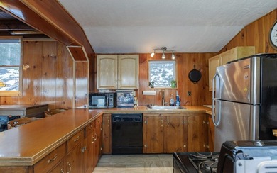 Perched on a 1-acre lot with a truly million-dollar, 180 view of - photo 9