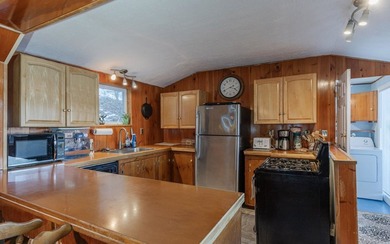 Perched on a 1-acre lot with a truly million-dollar, 180 view of - photo 10