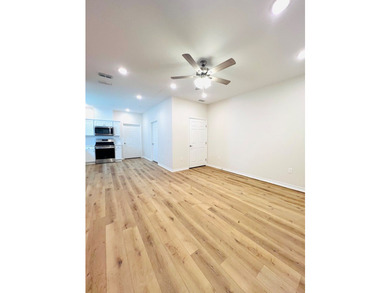 Beautiful 2022-Built Townhome in Gated community. This - photo 4