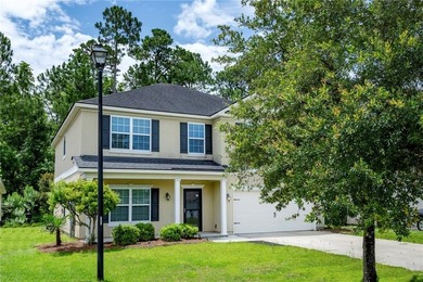 Nestled in the established neighbor of Winding River, this - photo 2