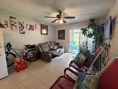 Ground-floor convenience meets low-maintenance living in this - photo 4
