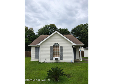 Located in the Orange Grove area of Gulfport, this 3-bedroom - photo 1