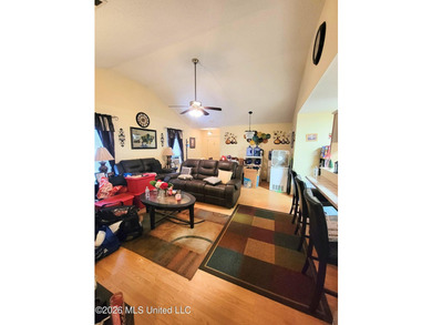 Located in the Orange Grove area of Gulfport, this 3-bedroom - photo 3