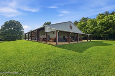 Tucked at the end of an 800-foot gravel drive just outside - photo 1