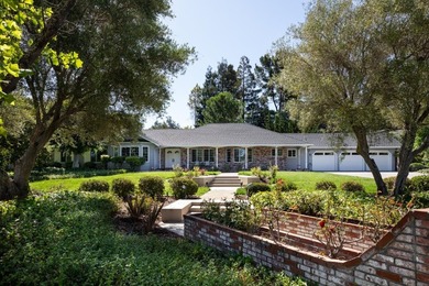 Situated on a pristine, park-like 0.92-acre lot, this stunning 3 - photo 1