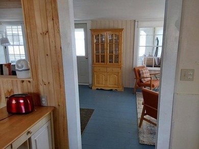 Escape to your own lakeside retreat with this inviting - photo 2