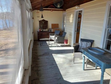 Escape to your own lakeside retreat with this inviting - photo 3