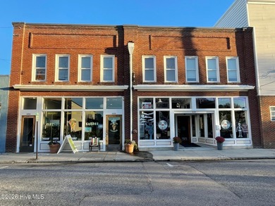 Fully renovated in 2022, this beautifully restored 742 sf - photo 1
