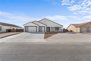 This brand new construction home in Artesia is packed w/upgrades