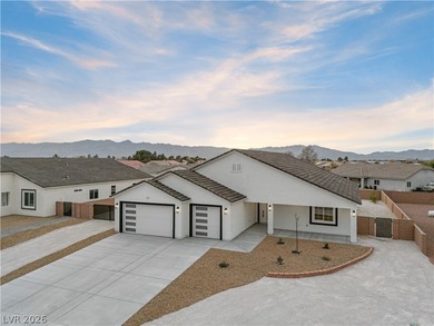 This brand new construction home in Artesia is packed w/upgrades