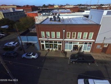 Fully renovated in 2022, this beautifully restored 742 sf - photo 3