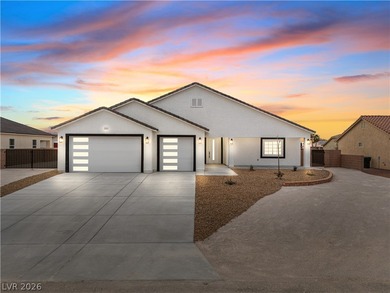 This brand new construction home in Artesia is packed w/upgrades
