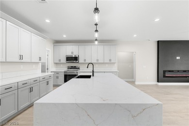 This brand new construction home in Artesia is packed w/upgrades